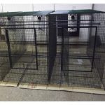 Black bird cage with door open