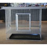 Front of chicken cage with door closed